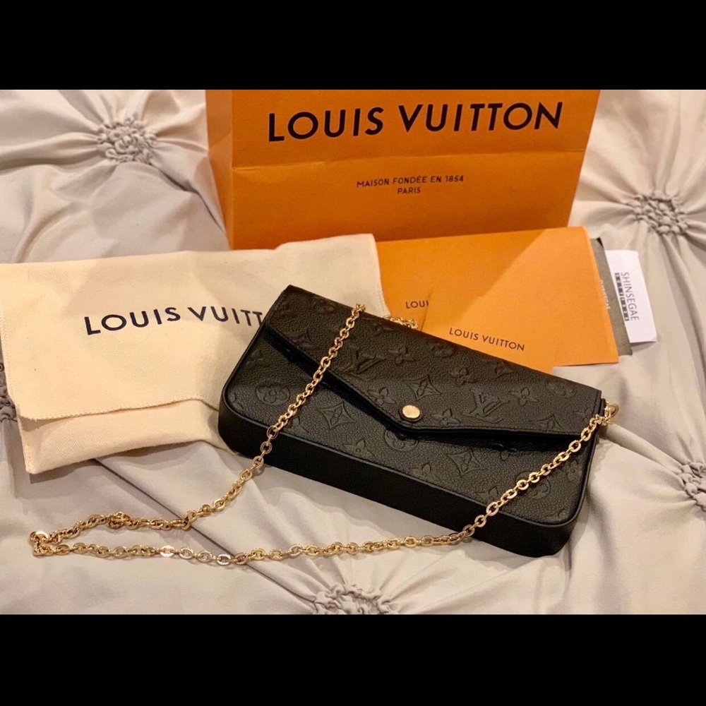 Authentic Louis vuitton clutch,Brandnew